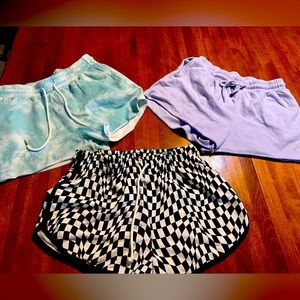 Lot of 3 pairs flirtitude shorts. Checkered never worn. Size medium